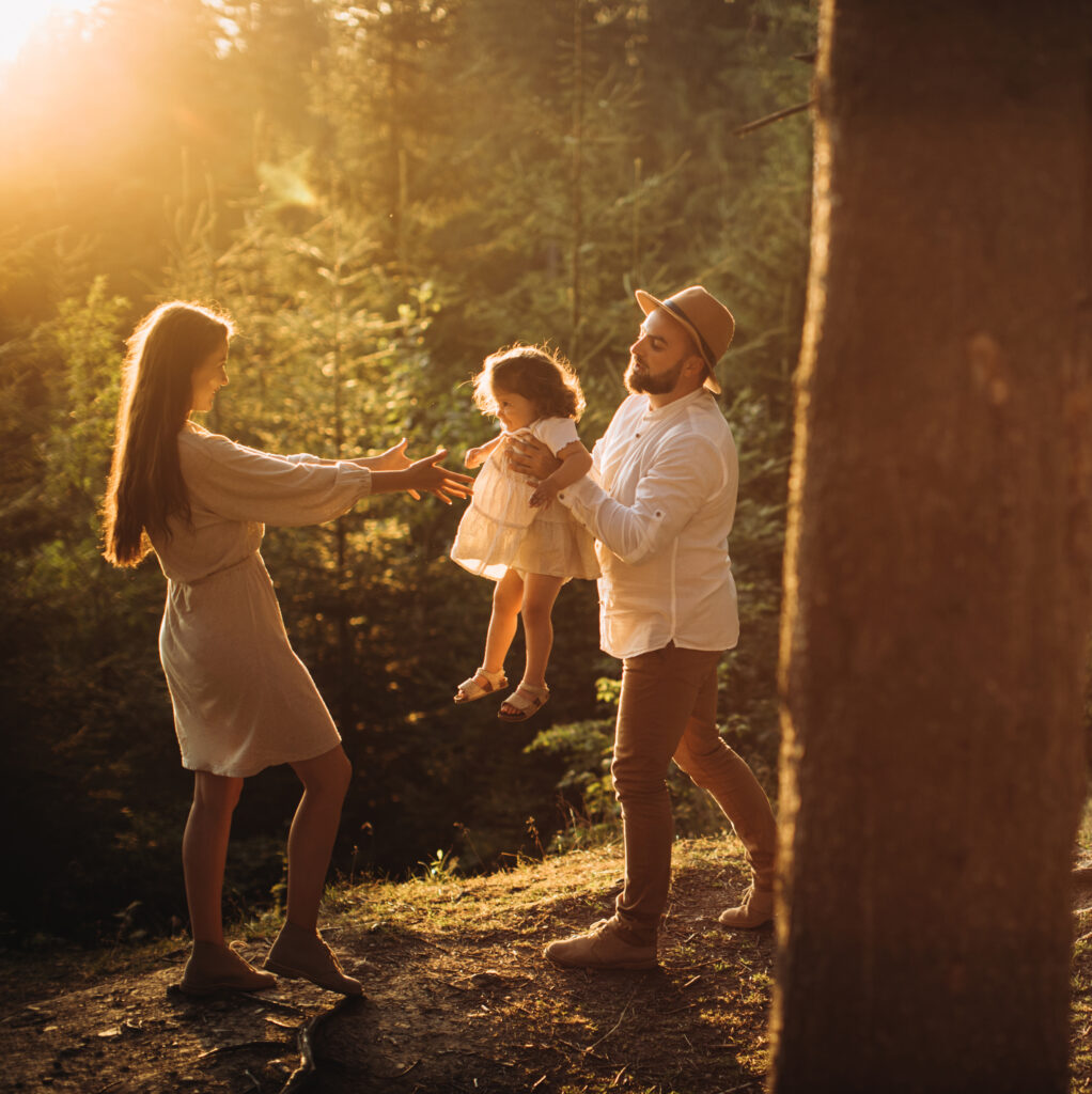 young-happy-family-playing-in-sunny-mountains-2026-01-09-06-39-22-utc
